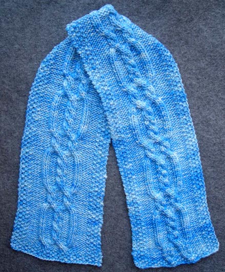 Cable Scarf Knitting Pattern. There is also a matching hat and fingerless 